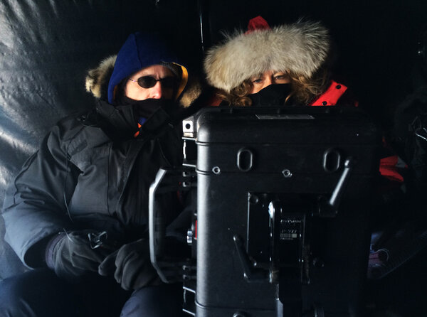 Combo! - Christophe and Rachel are checking a take inside a rolling UAZ. Ergonomics and efficiency of the protections designed by Panavision for our monitors, embedded in Pelicase flight cases, work perfectly. <i>(Gilles Porte, Monday 23 February)</i>