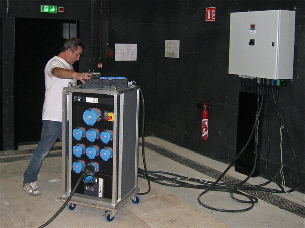 A movable electric cabinet plugged into a power station in the wall - Photo JNF/EG/VJ