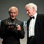 Philippe Rousselot, Angénieux Optimo 28-76 mm en mains, et John Boorman - Photo Pauline Maillet 