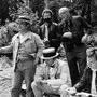 On the set of Yannick Andréi's "The Double Life of Théophraste Longuet" - From L. to R.: Jean Carmet, Michel Duchaussoy, sat, (...) 