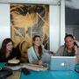 Mélanie Toubeau, Garance Cosimano et Myriam Guedjali, souriantes collaboratrices de l'équipe accueillante de la CST à Cannes - Photo (...) 