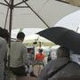 Parapluie et parasol - lors du Rendez-vous de midi Panasonic de la CST (Photo JN Ferragut) 