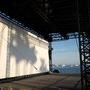 Ombre de palmiers projetée au soleil couchant sur l'écran du Cinéma de la plage - Photo Jean-Noël Ferragut 