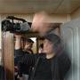 Sur le tournage de "La Graine et le mulet" - Lubomir Bakchev tenant une DVX 100 pour filmer les répétitions (Photo Loïc Malavard) 