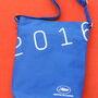 Sac "officiel" sur fond de tapis rouge - Photo Jean-Noël Ferragut 