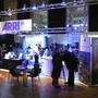 Near the hall, partners show 