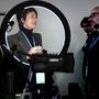 Marie-José Collet dans un anneau de lumière sur le stand TSF Lumière - Photo AFC Nelly Florès 