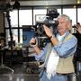 Michel Beaudour, SBC, caméra Sony à l'épaule, sur fond de stand Emit - © Nelly Flores - AFC 