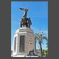 Couronne de lauriers et palme d'or dans les mains de Niké au sommet d'un monument signé Albert Cheuret