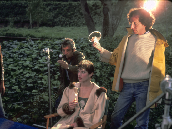 Willy Kurant, left, and Tom Stern pampering by Nastasja Kinski, bathed in light, in 1981