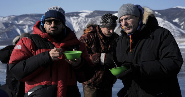 The Best soup - Christophe Rossignon, producer, shares a soup with us, Safy, Nicolas (center) and the crew on the lake Baïkal two days after we've had petit fours from the Fouquet's, after Nord-Ouest was rewarded with three Cesar for the movie <i>Les Combattants</i>: Best First Feature Film, Most Promising Actor and Best Actress… A big thought for Philip Boeffard, producer at Nord-Ouest, who won't be with us. Without him <i>The Consolations of the Forest</i> wouldn't be seen on the big screen. <i>(Gilles Porte, Sunday 22 February)</i>