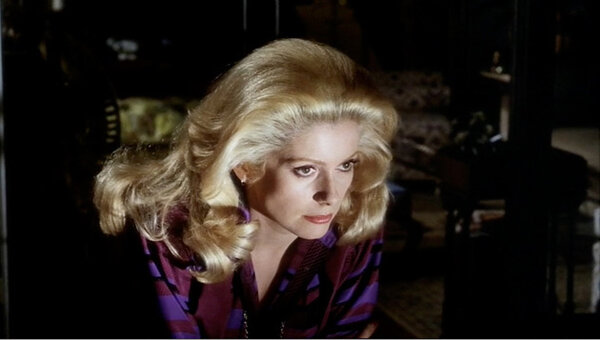 Catherine Deneuve in “Hustle”