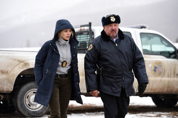 Elizabeth Olsen and Graham Greene