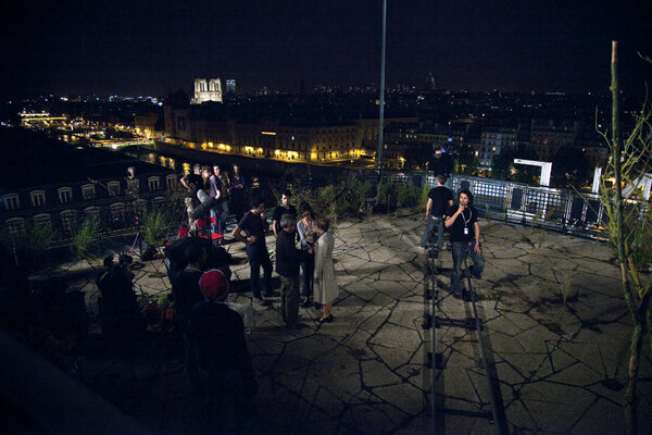 Outside at night on the rooftop of the Samaritaine - © Camille du Chenay