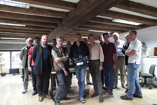 The "AFC-AFSI" members with almost all the members of the Aaton-Digital team - From L to R: Philippe Ros, Gilles Deshays, Frédéric Ullman, Pascal Grillère, Jean-Noël Ferragut, Elisabeth Perrin, Frédéric Mangeat, Michel Cassang, Pierre Michoud, Olivier Le Vacon, Paul Thilloy, Yves Rivière, Jacques Delacoux, Sébastien Brum (The following members of Aaton-Digital are not portrayed in the photo: Jean-Pierre Charras, Caroline Hostalier, Nicolas Pinault, Sébastien Reyes) - Photo taken with a camera timer by Jacques Delacoux