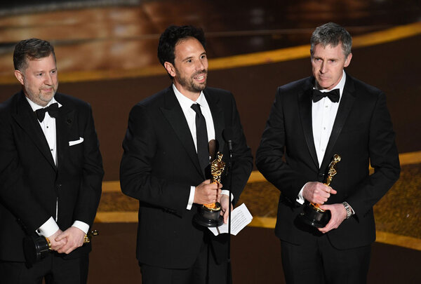 Les lauréats de l'Oscar 2020 des Effets visuels - De g. à d. : Greg Butler, Guillaume Rocheron et Dominic Tuohy - Photo Académie des Oscars
