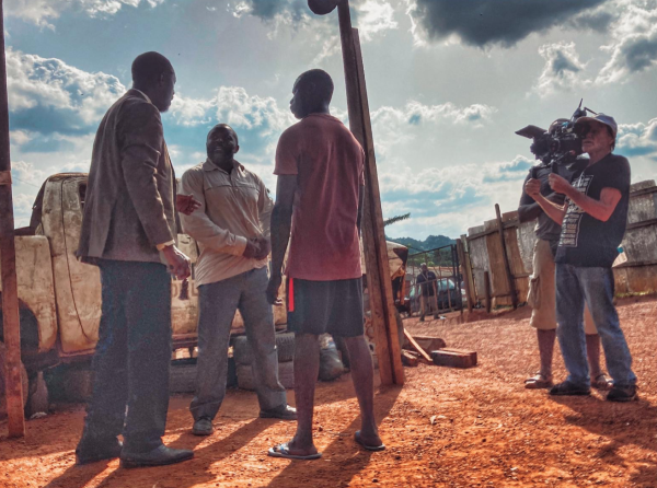 Thomas Ndgijol, left, and Patrick Blossier, behind the camera