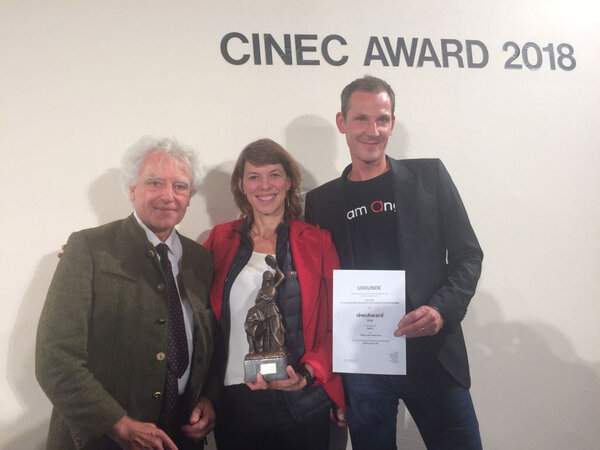 Séverine Serrano, Managing Director, Angenieux International Sales & Communication, surrounded by Jean-Yves Le Poulain (left) and Jacques Bouley (right)