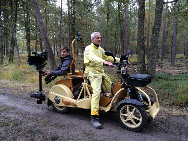 Loïc Savouré, at the camera, and Alexander Bugel, driving the scooter on "Seasons"