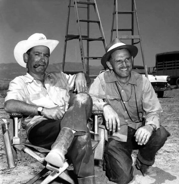 Samuel Fuller and Joseph Biroc on location of “Run of the Arrow”